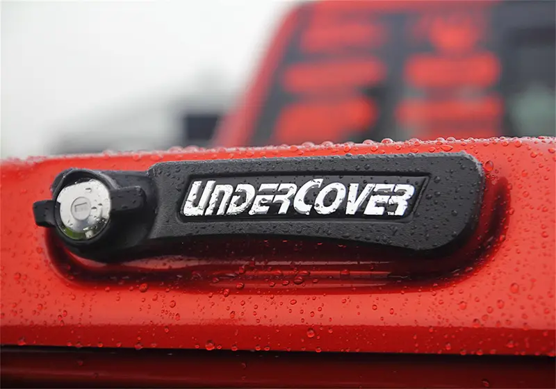 Undercover Uc2148L-Uj Ex Hard Folding Tonneau Cover For 2009–2014 Ford F-150 (5'7" Bed) 1